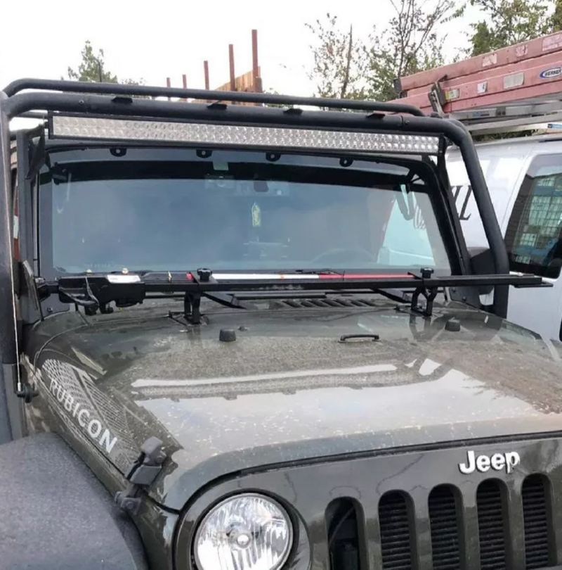 Load image into Gallery viewer, Jack brackets installed with jack on great jeep in parking lot

