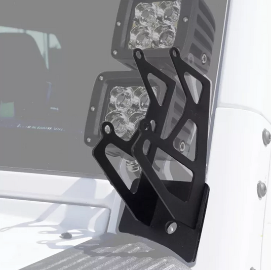 Detail of brackets with ghost image of lights overlayed on image of jeep