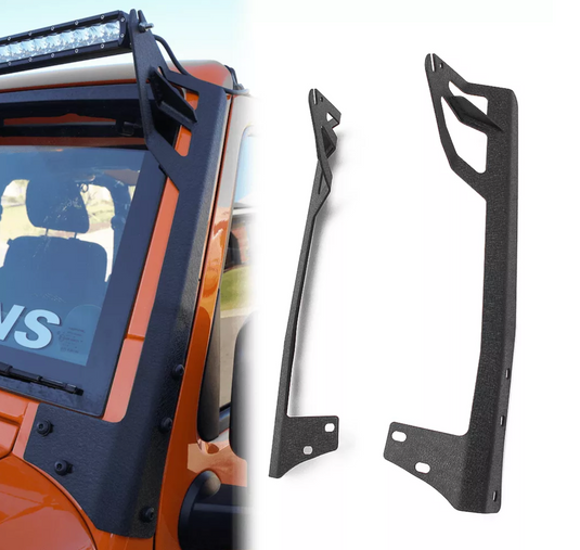 Orange jeep with light bar installed on brackets, braket detail