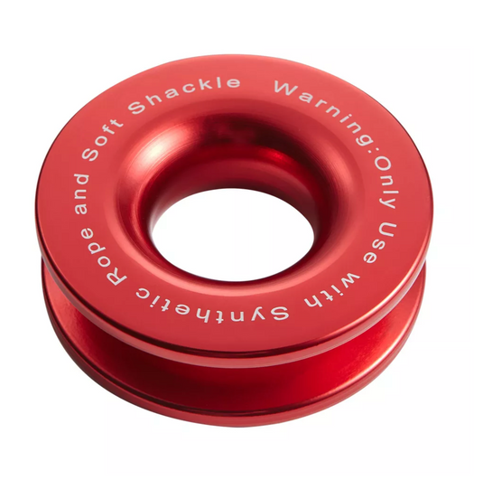 Detail of red snatch ring bearing "warning: only use with synthetic rope and soft shackle"